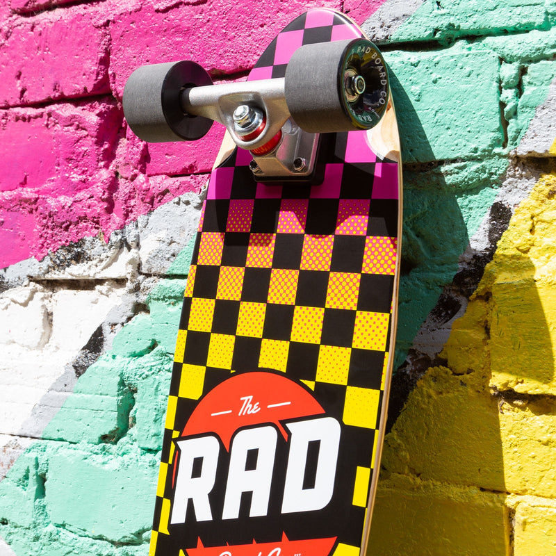 RAD Complete Retro Roller 7.9" x 27.9" Skateboard - Checker Neon Fade